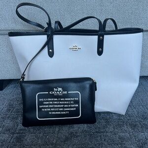 Coach Cream and Black Reversible Tote with attached mini bag.